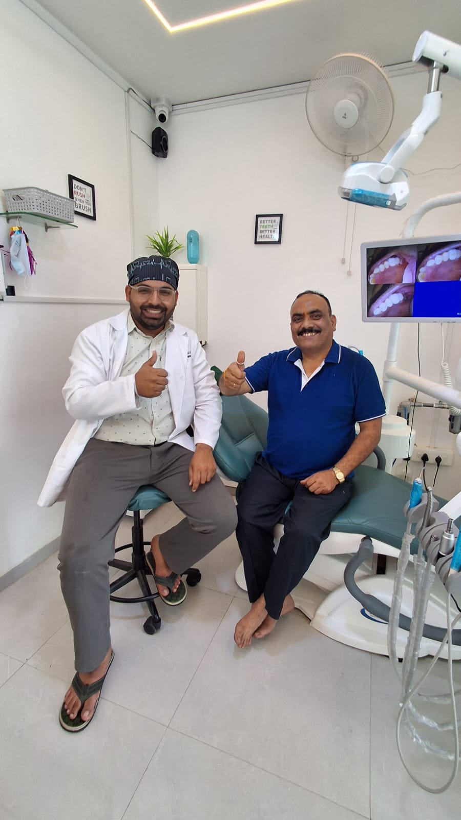Dr. Swapnil Bade with happy patient at Family Dental Clinic Ravet
